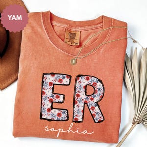 Comfort Colors ER Nurse Shirt: Floral Design, Soft Cotton, Vintage Style