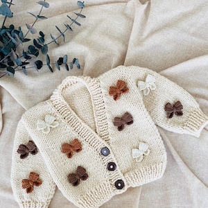 Handmade Baby Sweater with Crochet Bow - Soft Baby Cardigan for Stylish Outfits