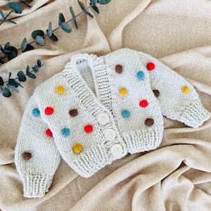 Knit Baby Sweater with Colorful Pom Poms – Handmade Baby Cardigan, Crochet Baby Gift, Toddler Girl Outfit