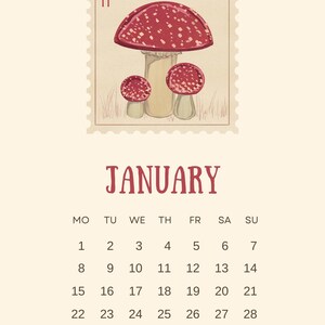 Pode incluir: Um calendário de estilo vintage com uma ilustração de um cogumelo vermelho e branco. O calendário é para janeiro de 2024 e inclui os dias da semana e as datas.