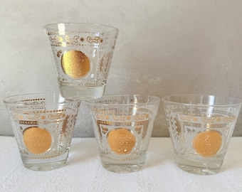 Juego de 4 vasos de whisky Hazel Atlas de mediados de siglo: Medallón con calendario azteca dorado.