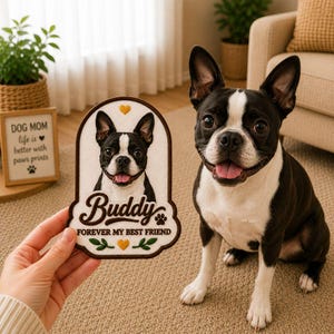 May include: A Boston Terrier dog sits next to a patch with a Boston Terrier portrait and the name "Buddy". The patch reads "Forever My Best Friend" with paw prints and heart accents. A small framed sign reads "Dog Mom life is better with paws prints".