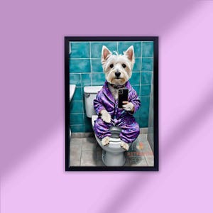 May include: A framed print featuring a white dog wearing purple pajamas and taking a selfie while sitting on a toilet. The dog is in a bathroom with teal tile. The print is in a black frame.