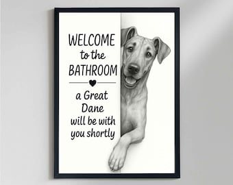 May include: Black framed wall art with a Great Dane illustration. The art piece has the text "WELCOME to the BATHROOM" above a heart symbol, followed by "a Great Dane will be with you shortly."