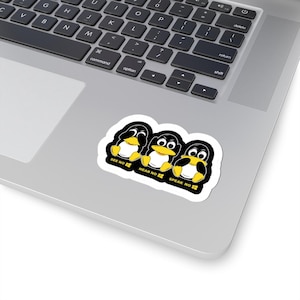 May include: A sticker featuring three cartoon penguins in a "See No Evil, Hear No Evil, Speak No Evil" pose. The penguins are black and white with yellow bellies and feet. The sticker has the text "SEE NO", "HEAR NO", and "SPEAK NO".