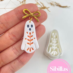 Folk art clay cutter set for polymer clay earrings, Nordic fall designs, handmade charms, and seasonal jewelry making.