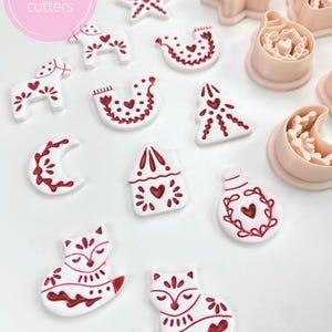 Folk-style Christmas clay cutters for polymer clay earrings and ornaments.
