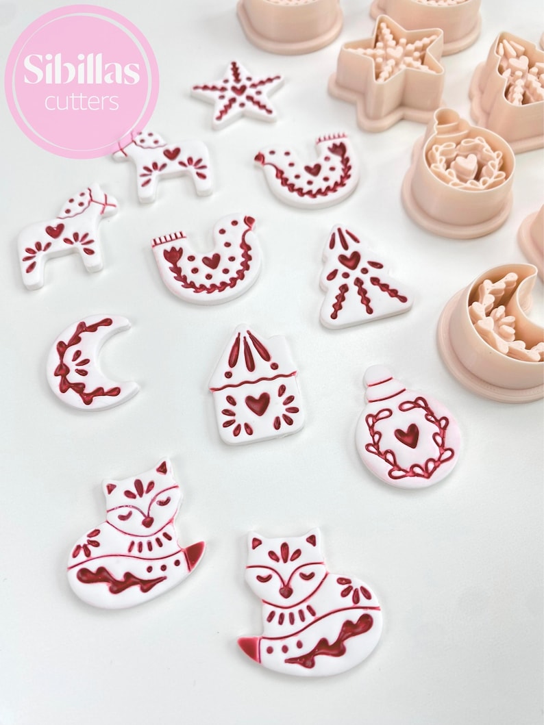Folk-style Christmas clay cutters for polymer clay earrings and ornaments.