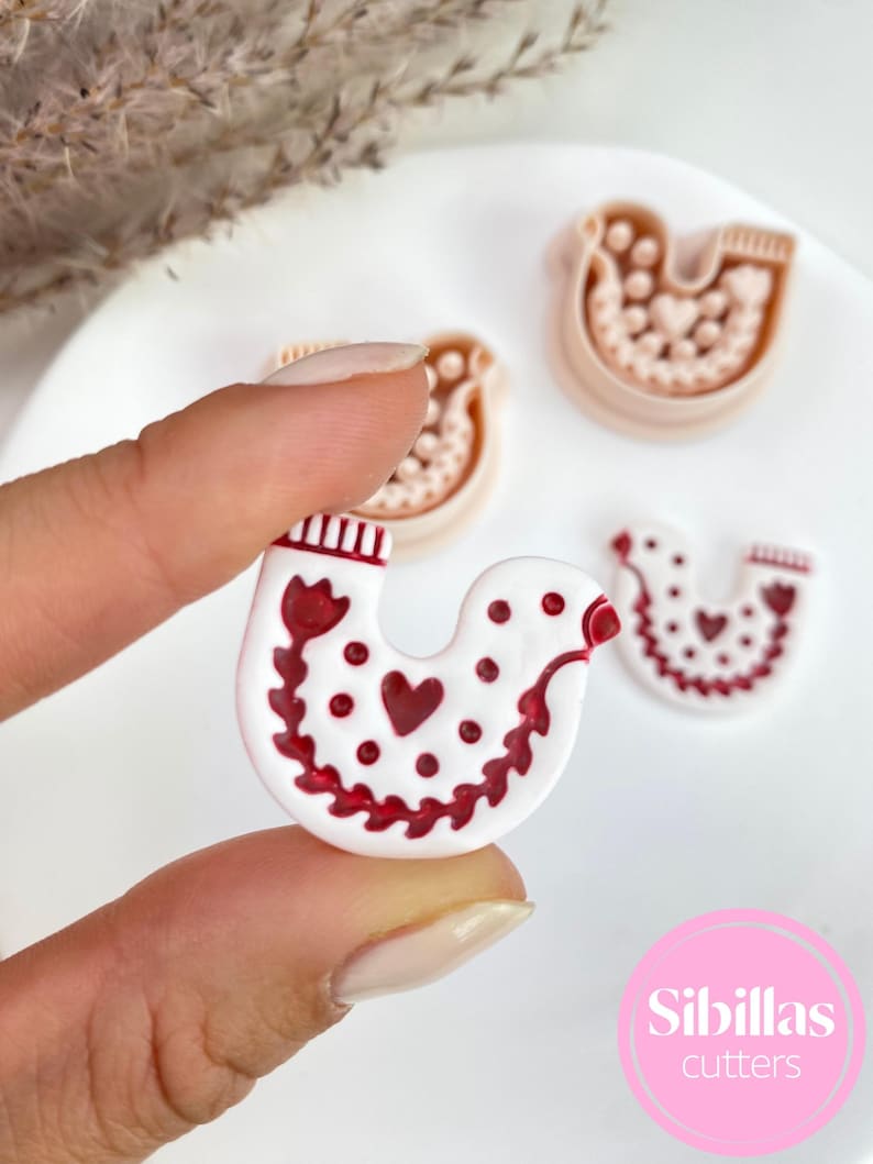 Nordic holiday polymer clay earring cutters with star, moon, and dove