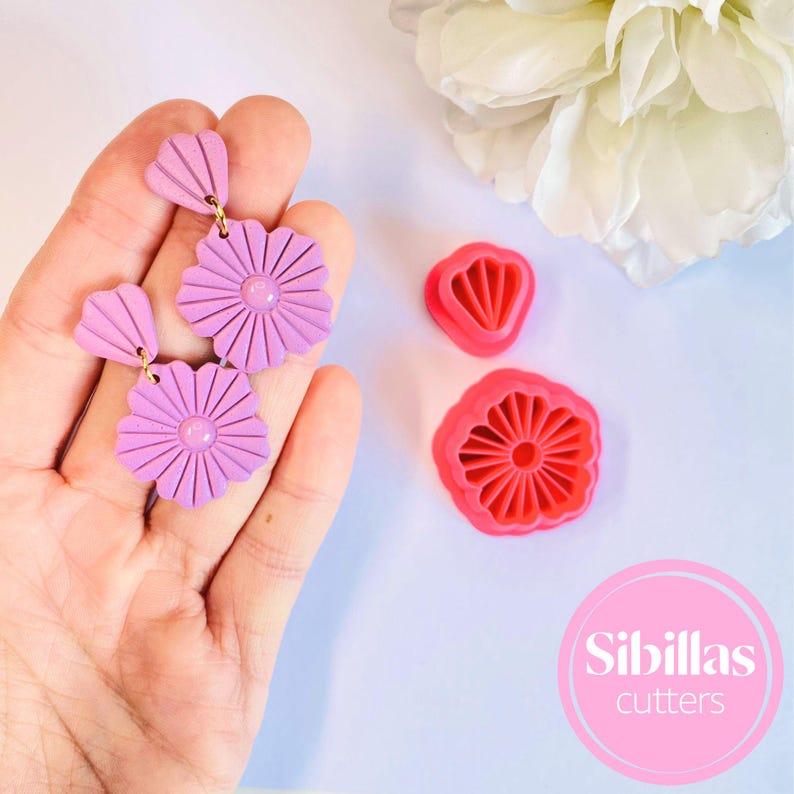 Embrace the beauty of nature with this Boho flower polymer clay cutter. Perfect for creating embossed floral earrings, keychains, and charms, this cutter adds a bohemian flair to your summer jewelry designs. Made from eco-friendly PLA, it ensures clean, precise cuts in polymer clay and other soft materials. Ideal for spring and summer-themed projects, this unique tool allows you to craft beautiful, floral-inspired accessories with ease."