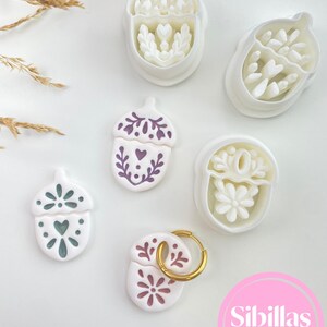 Fall polymer clay cutter set with Nordic folk art designs for Halloween earrings, charms, and handmade clay jewelry.