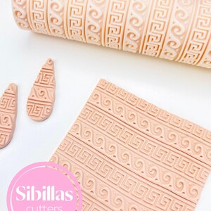 Polymer clay texture roller with an Ancient Greek decorative pattern, designed to emboss elegant, classical lines and motifs onto clay surfaces. Perfect for jewelry makers, potters, and DIY crafters who love ornamental detail. This roller works beautifully for earrings, pottery, trays, or home décor pieces, creating a sophisticated Greek-inspired finish. Durable, reusable, and easy to clean, it helps achieve a professional result for both beginners and experienced clay artists.