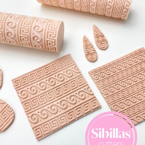 Ancient Greek texture roller for polymer clay, pottery, and ceramics. This embossing tool features an intricate classical pattern inspired by traditional Greek motifs, perfect for adding elegant, ornamental detail to clay projects. Ideal for creating earrings, pendants, trays, pottery decorations, and other handcrafted pieces. Made from durable, reusable material, this roller gives artists a clean and consistent impression, allowing them to bring timeless, historic beauty into their handmade