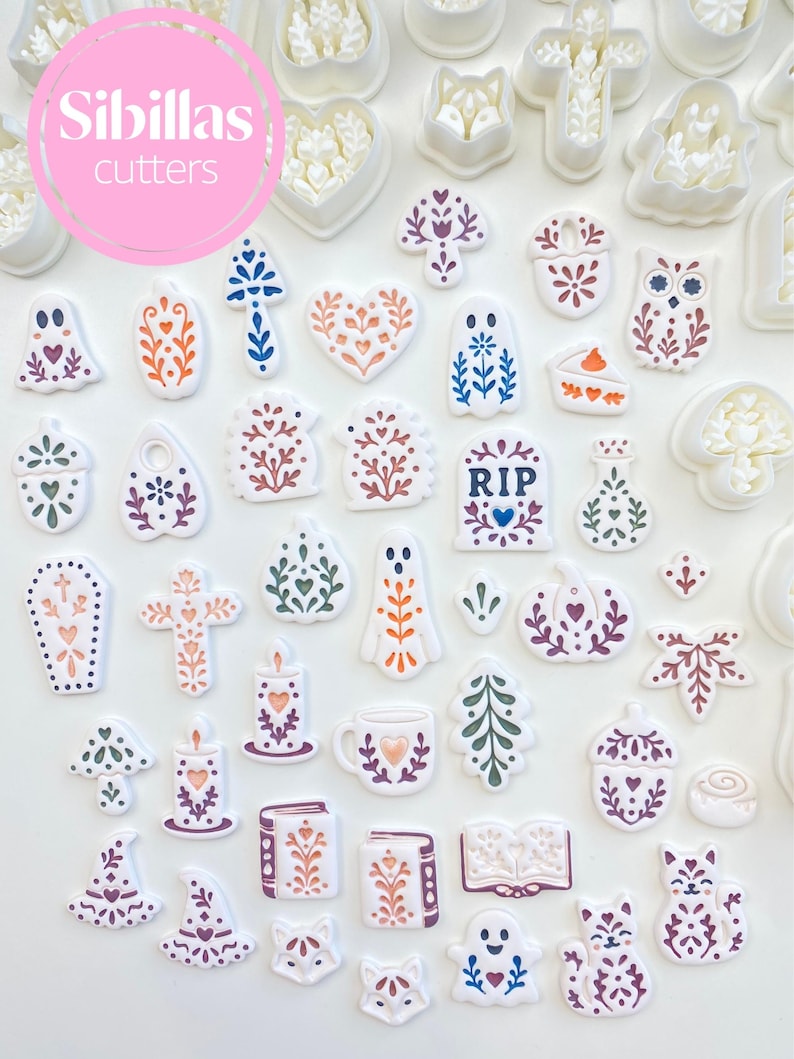 Polymer clay jewelry tools with folk art fall cutters, Scandinavian designs, ghost charms, pumpkins, and autumn earrings.