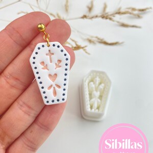 Autumn polymer clay cutters for earrings, Scandinavian folk art charms, Halloween jewelry, and seasonal clay supplies.