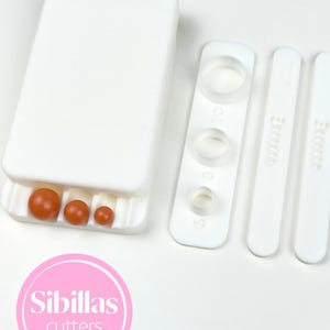 Polymer clay bead roller tool for crafting 6mm, 8mm, and 10mm round beads, suitable for DIY jewelry makers, hobbyists, and small business owners. Create perfect beads for earrings, bracelets, necklaces, and bead strands using polymer clay, air-dry clay, or epoxy clay. Precision roller guide ensures smooth, uniform, professional-quality beads for handmade jewelry projects, polymer clay crafts, bead-making kits, and clay earring supplies, helping crafters achieve consistent results with ease