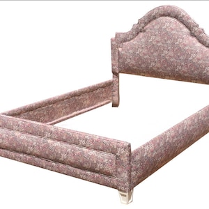 May include: A pink floral upholstered bed frame with a headboard that has a curved top and a tufted design.