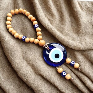 Colgante de puerta con cuentas de madera de olivo, amuleto turco Nazar