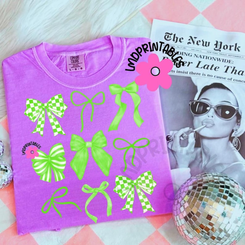 May include: A purple Comfort Colors t-shirt featuring a collection of green bows in various styles. Some bows have a checkered pattern. The text "LMDPRINTABLES" is visible. A black and white image of a woman is in the background.