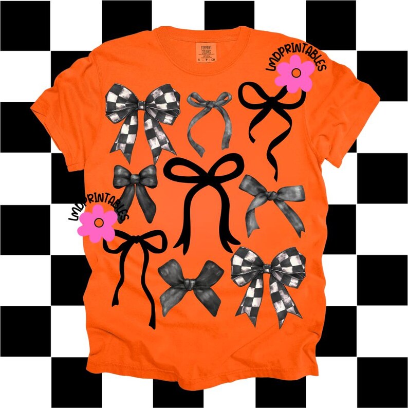 May include: Orange t-shirt featuring a collection of black and white checkered and solid black bows in various styles. The shirt includes the text "LMD Printables" and a pink flower graphic.