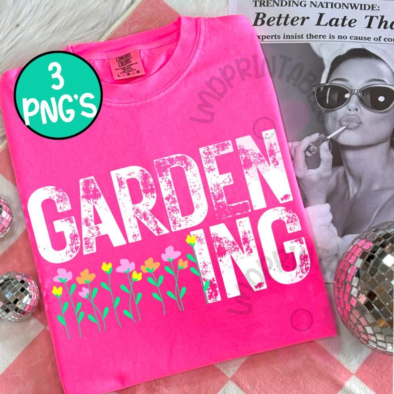 May include: A bright pink t-shirt with the word "GARDENING" in large white distressed letters. Below the text is a row of colorful flowers. A green circle with the text "3 PNG'S" is in the upper left corner.
