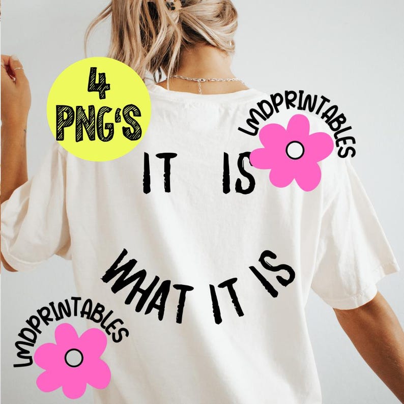 May include: Cream-colored t-shirt with the phrase "IT IS WHAT IT IS" in black block letters. The shirt also features a yellow circle with "4 PNG'S" and pink flower graphics with the text "LMDPRINTABLES".