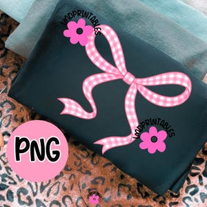 May include: A dark teal fabric with a pink gingham bow and two pink flowers. The text "LMD PRINTABLES" is on the flowers. A pink circle with the letters "PNG" is in the lower left corner.