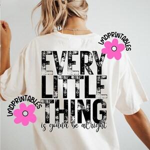 May include: Cream-colored t-shirt with the text "EVERY LITTLE THING is gonna be alright" in distressed black lettering. Pink flower graphics with the text "LMDPRINTABLES" are on the shirt.