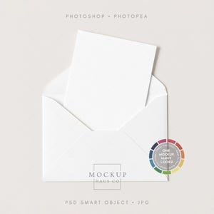 May include: A white envelope with a white card inside, set against a light background. The text "PHOTOSHOP • PHOTOPEA" is at the top, and "MOCKUP HAUS CO" is at the bottom. A color wheel graphic is on the right.