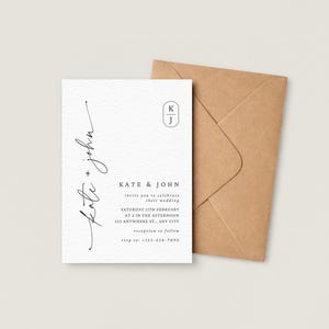 May include: A wedding invitation with the names "Kate + John" in elegant script. The invitation includes details about the wedding date, time, and location, along with a reception RSVP. A brown envelope is next to the invitation.