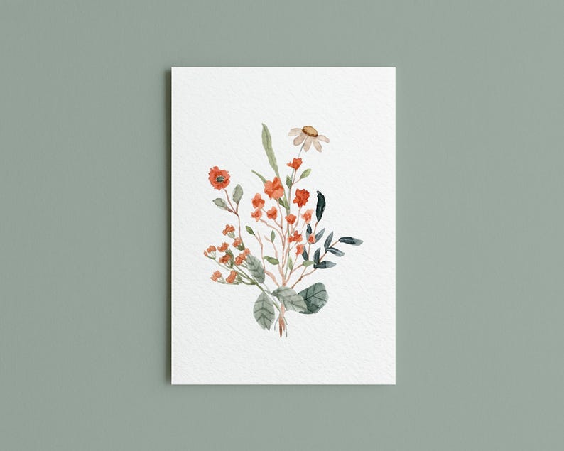 May include: Watercolor painting of a floral bouquet. The arrangement features orange and red flowers, green leaves, and a single daisy. The artwork is on a white rectangular paper against a muted green background.