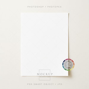 May include: A white rectangular mockup with a subtle diamond pattern. The text "PHOTOSHOP • PHOTOPEA" is at the top, and "MOCKUP HAUS CO" is at the bottom. A color wheel with the text "ONE MOCKUP MANY LOOKS" is on the right.