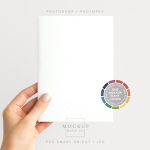 May include: A white card held by a hand, with the text "PHOTOSHOP &bull; PHOTOPEA" at the top. A colour wheel with the text "ONE MOCKUP, MANY LOOKS!" is on the right. The bottom has the text "MOCKUP HAUS CO" and "PSD SMART OBJECT &bull; JPG".