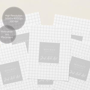 May include: A mockup image showing multiple white papers with a grid pattern. Each paper has a grey square with the text "MOCKUP" and "Just All Art". Two grey circles display the text "High Resolution" and "Meticulous Art Placement".