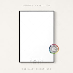 Puede incluir: Una maqueta rectangular con marco negro e interior blanco, colgada en una pared beige claro. El texto "PHOTOSHOP • PHOTOPEA" está en la parte superior y "MOCKUP HAUS CO" en la inferior. Una rueda de color está en el lado derecho.