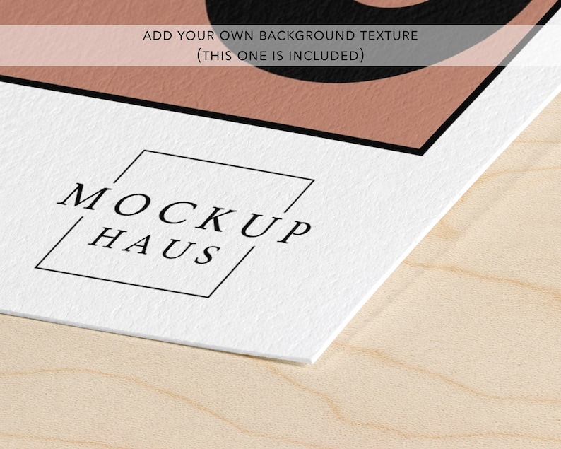 May include: A white paper mockup featuring the black text MOCKUP HAUS enclosed in a thin black square outline. Above this, a semi-transparent horizontal bar contains the black text ADD YOUR OWN BACKGROUND TEXTURE (THIS ONE IS INCLUDED).