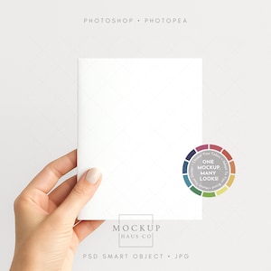 May include: A hand holding a blank white card, with the text "PHOTOSHOP • PHOTOPEA" at the top. A colour wheel graphic with the text "ONE MOCKUP, MANY LOOKS!" is on the right. The bottom text reads "MOCKUP HAUS CO PSD SMART OBJECT • JPG".