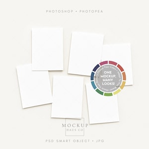 May include: A mockup featuring six white rectangular cards arranged in a circular pattern. A color wheel graphic with the text "ONE MOCKUP, MANY LOOKS!" is in the center. The words "PHOTOSHOP" and "PHOTOPAE" are at the top. The words "MOCKUP HAUS CO" and "PSD SMART OBJECT . JPG" are at the bottom.