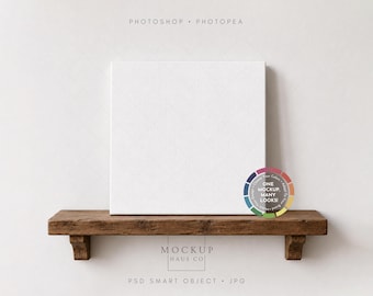 Mockup PSD di tela quadrata, mensola rustica, esposizione di opere d'arte a parete, scena di arredamento domestico minimalista e neutro