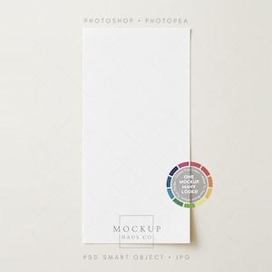 May include: A white rectangular mockup with a subtle diamond pattern. The text "PHOTOSHOP • PHOTOPEA" is at the top, and "MOCKUP HAUS CO" is at the bottom. A color wheel with the text "ONE MOCKUP MANY LOOKS" is on the right.
