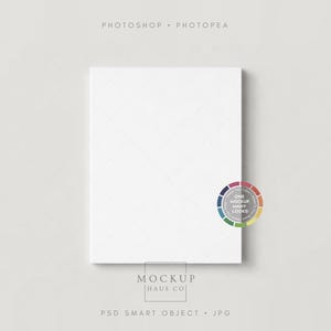 May include: A white canvas mockup with a subtle grid pattern, ideal for showcasing artwork or designs. The image includes text at the top and bottom, along with a color palette wheel on the right side. The words "Photoshop" and "Photopea" are visible.