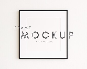 May include: A square black picture frame with a white mat. The text "FRAME MOCKUP" is displayed in black, along with "JPG • PNG • PSD". The frame is centered on a white background.