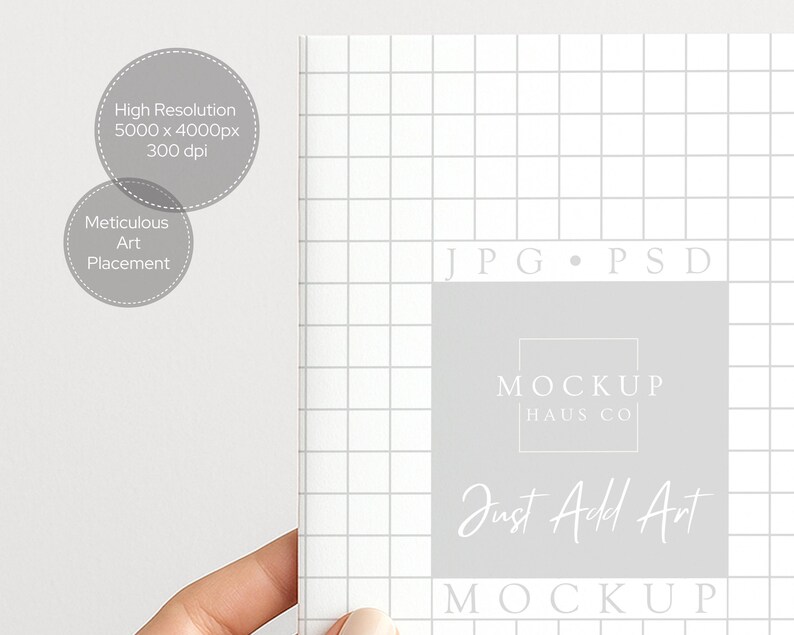 May include: A white notebook with a grid pattern, featuring the text "MOCKUP HAUS CO" and "Just Add Art." The image also includes text indicating high resolution and meticulous art placement, ideal for digital art mockups.