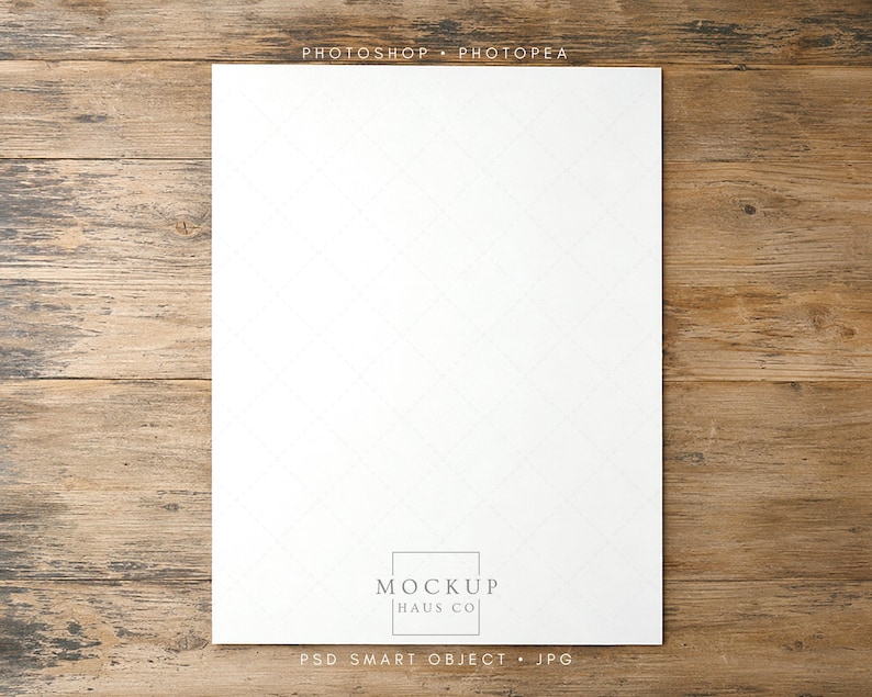May include: A vertical rectangular white paper mockup centered on a rustic wooden surface. The top edge features the text PHOTOSHOP &bull; PHOTOPEA and the bottom center displays a square logo with the text MOCKUP HAUS CO above PSD SMART OBJECT &bull; JPG.