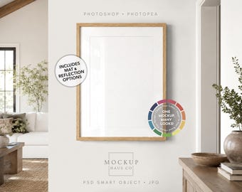 May include: A vertical rectangular wooden picture frame mockup with a white center area. The image includes text overlays stating PHOTOSHOP, PHOTOPEA, INCLUDES MAT & REFLECTION OPTIONS, ONE MOCKUP, MANY LOOKS, MOCKUP HAUS CO, and PSD SMART OBJECT, JPG.