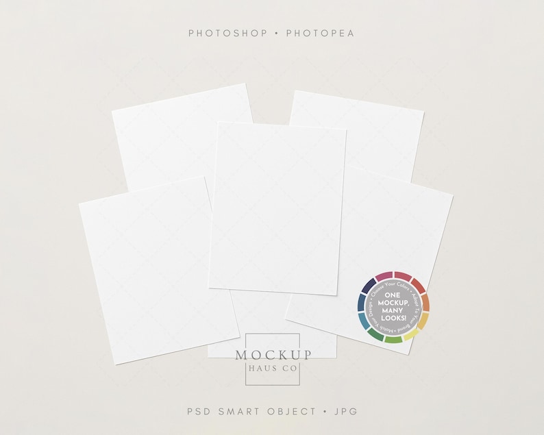 May include: A mockup featuring five white rectangular cards on a light beige background. The cards overlap slightly, with a colour wheel graphic and the text "ONE MOCKUP, MANY LOOKS!" in the lower right corner. The words "MOCKUP HAUS CO" are also visible.