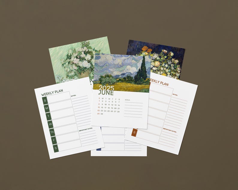 May include: A selection of printed paper items, including a calendar page for June 2025, weekly planner sheets, and art prints featuring floral and landscape paintings. The items are arranged on a brown surface.