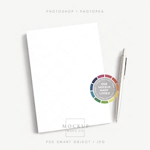 May include: A blank white rectangular paper mockup with a silver ballpoint pen. The image features text reading PHOTOSHOP • PHOTOPEA, MOCKUP HAUS CO, PSD SMART OBJECT • JPG, and a circular graphic with the text ONE MOCKUP, MANY LOOKS!