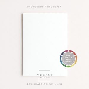 May include: A white rectangular mockup with a subtle grid pattern. The text "PHOTOSHOP &bull; PHOTOPEA" is at the top. A color wheel with the text "ONE MOCKUP, MANY LOOKS!" is on the right. The bottom has the text "MOCKUP HAUS CO" and "PSD SMART OBJECT &bull; JPG".