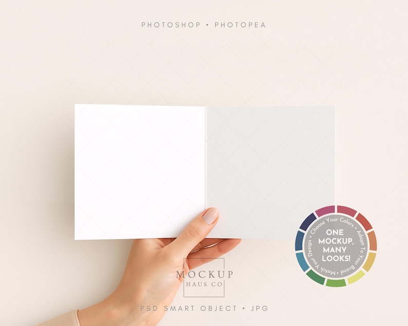 May include: A white, open card held by a hand, with a color wheel graphic in the lower right corner. The card is blank, with a subtle grid pattern. Text at the top reads "PHOTOSHOP &bull; PHOTOPEA". The color wheel says "ONE MOCKUP, MANY LOOKS!"
